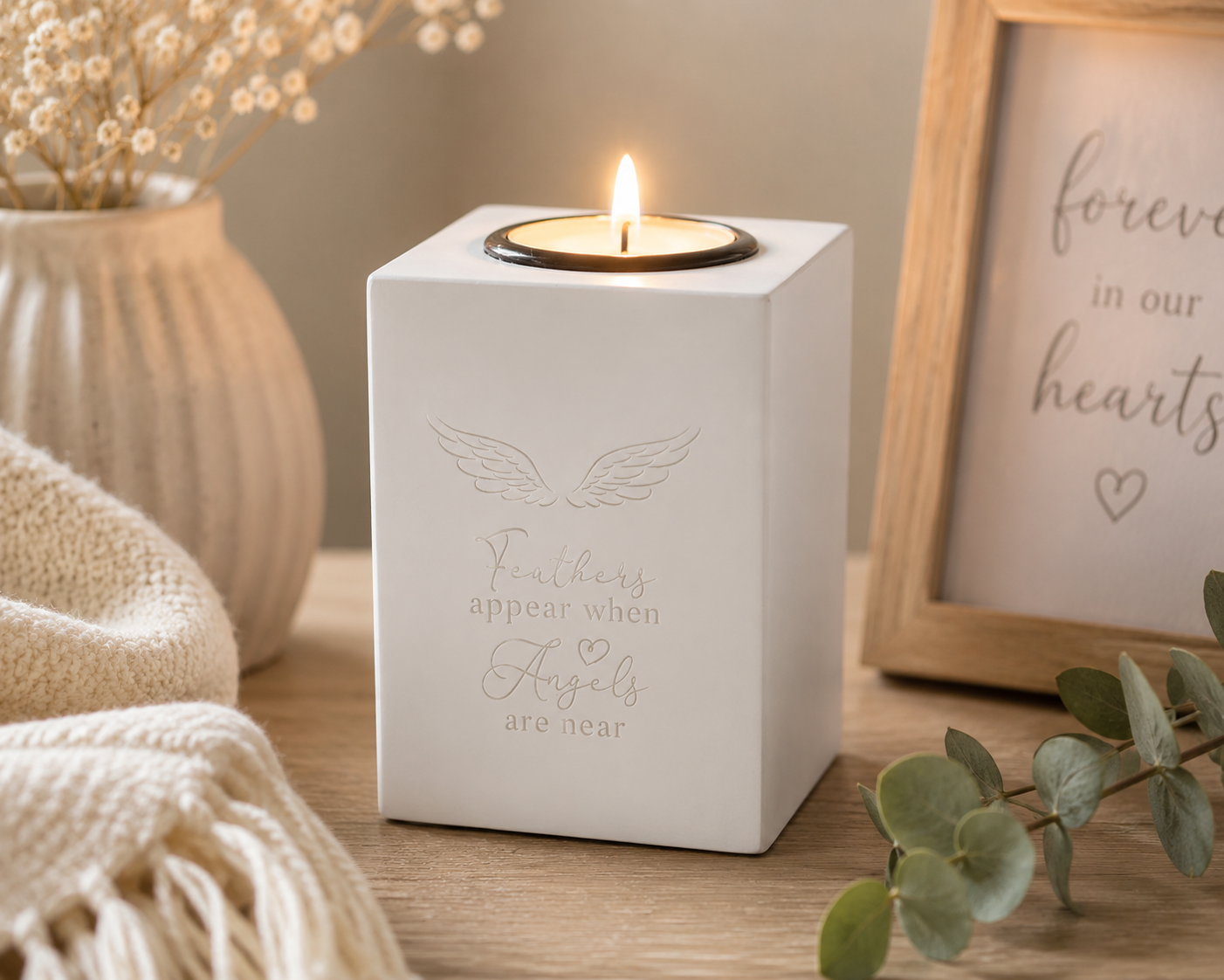 Feathers appear when angels are near tealight holder